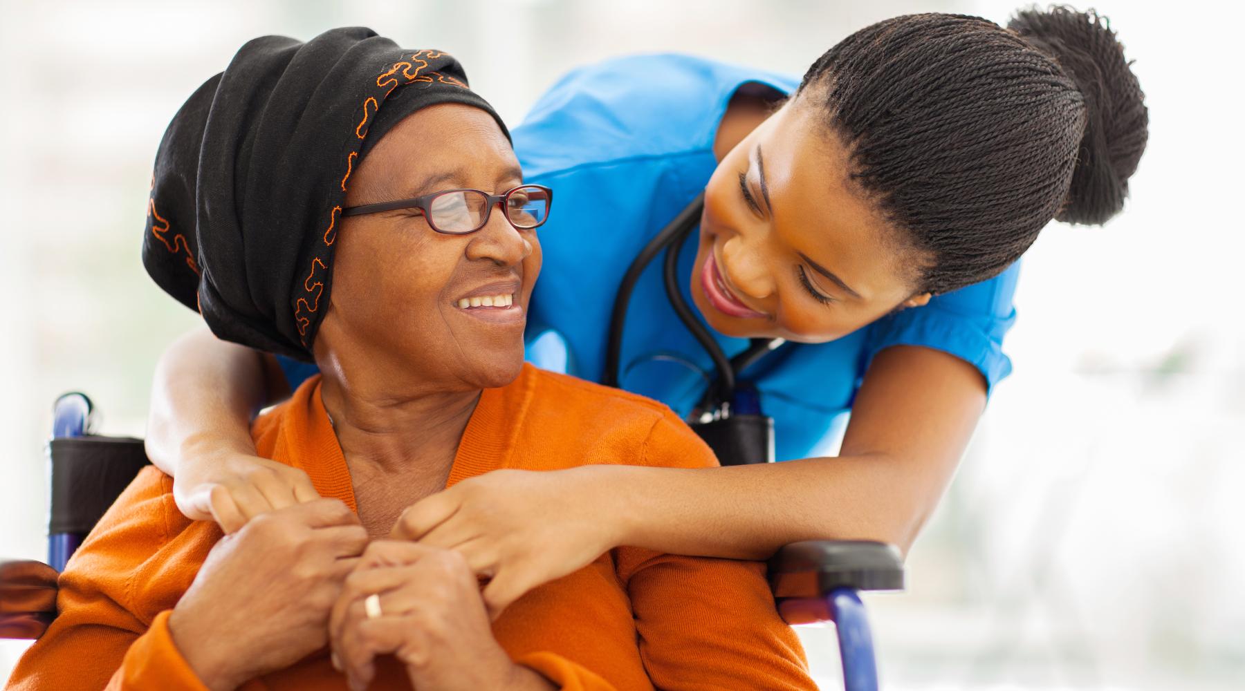 happy senior patient with friendly female nurse